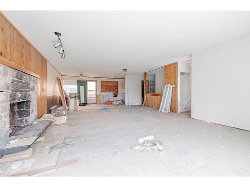 1725 13Th Avenue, Invermere, BC - Indoor Photo Showing Other Room With Fireplace