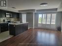 720 - 60 Dunsheath Way, Markham, ON  - Indoor Photo Showing Kitchen With Upgraded Kitchen 