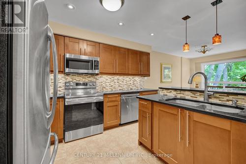 23 - 8305 Mclaughlin Road, Brampton, ON - Indoor Photo Showing Kitchen With Double Sink