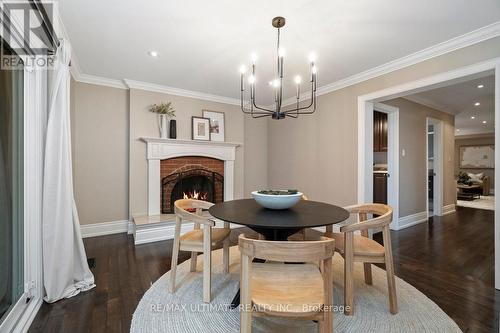 1684 Bough Beeches Boulevard, Mississauga, ON - Indoor Photo Showing Dining Room With Fireplace