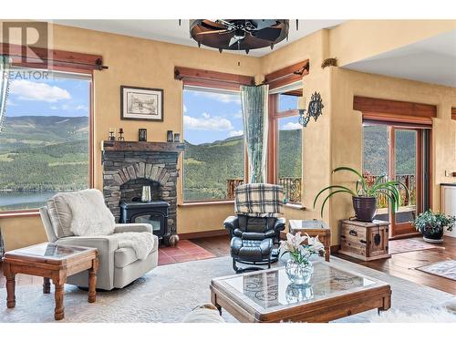 1309 Eagle Ridge Road, Lumby, BC - Indoor Photo Showing Living Room With Fireplace