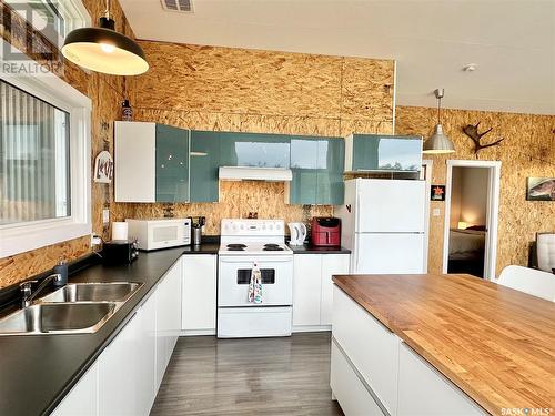 117 Ravine Road, Big Shell, SK - Indoor Photo Showing Kitchen With Double Sink