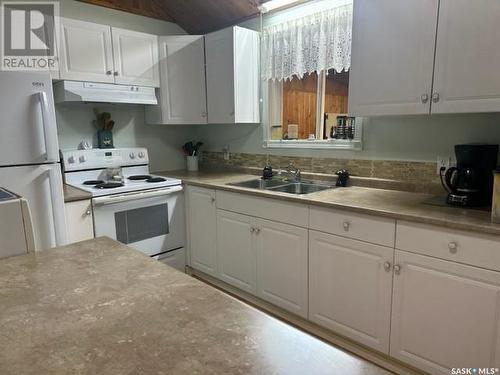 711 Waskos Drive, Lac La Ronge, SK - Indoor Photo Showing Kitchen With Double Sink