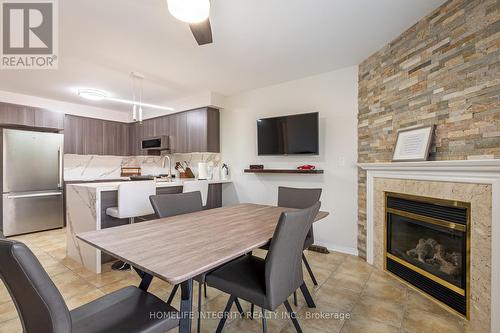 4 Silverbell Court, Brampton, ON - Indoor Photo Showing Dining Room With Fireplace