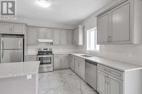 3007 Doyle Drive, London, ON - Indoor Photo Showing Kitchen With Double Sink