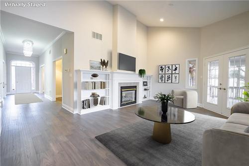 Virtually Staged Photo - 586 Canboro Road, Fenwick, ON - Indoor Photo Showing Living Room With Fireplace