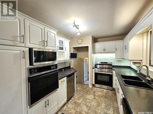 49 Kirk Crescent, Saskatoon, SK - Indoor Photo Showing Kitchen With Double Sink