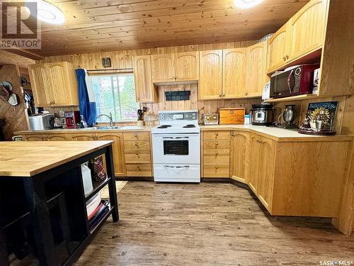 19 Mathews Crescent, Turtle Lake, SK - Indoor Photo Showing Kitchen With Double Sink