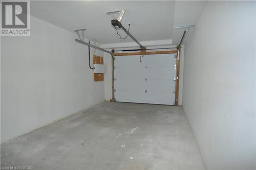 Garage - 1685 9Th Avenue E Unit# 1, Owen Sound, ON - Indoor Photo Showing Garage