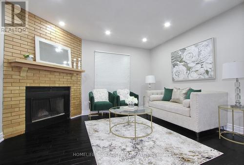 4 Adam Street, Brampton, ON - Indoor Photo Showing Living Room With Fireplace