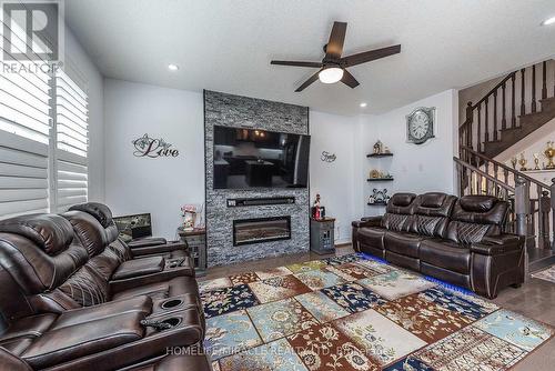 17 Bachelor Street, Brampton, ON - Indoor Photo Showing Living Room With Fireplace