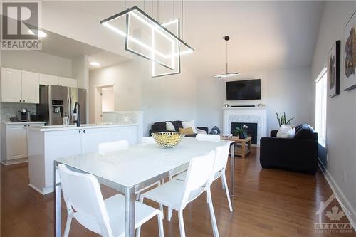 927 Como Crescent, Orleans, ON - Indoor Photo Showing Dining Room With Fireplace