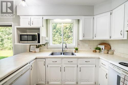15 Don Court, Kawartha Lakes, ON - Indoor Photo Showing Kitchen With Double Sink