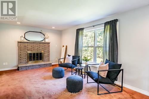 15 Don Court, Kawartha Lakes, ON - Indoor Photo Showing Living Room With Fireplace