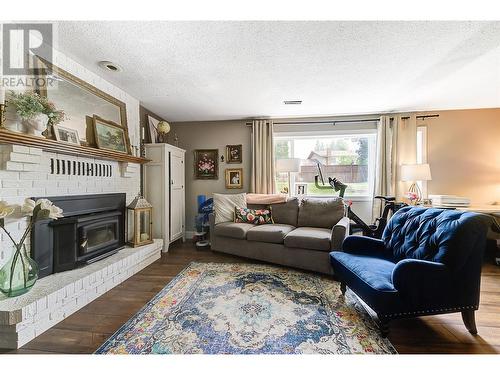 3117 Shannon Place, West Kelowna, BC - Indoor Photo Showing Living Room With Fireplace