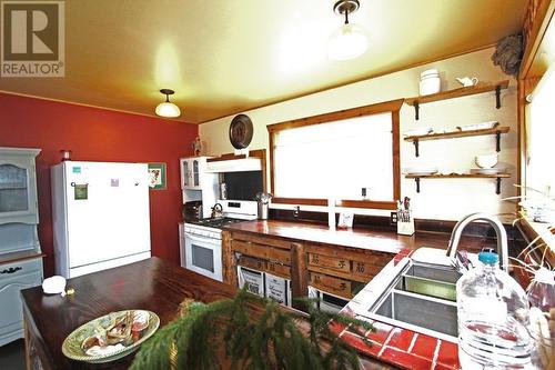 1558 Millard Street, Masset, BC - Indoor Photo Showing Kitchen With Double Sink