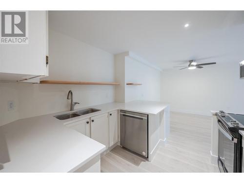 217 Elm Avenue Unit# 207, Penticton, BC - Indoor Photo Showing Kitchen With Double Sink