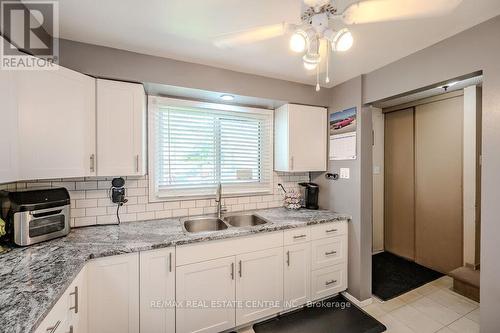 A2 - 223 Pioneer Drive, Kitchener, ON - Indoor Photo Showing Kitchen With Double Sink