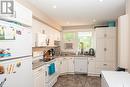 5 4 Neill Place, Regina, SK  - Indoor Photo Showing Kitchen With Double Sink 