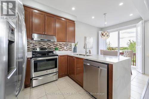 12 Robert Parkinson Drive, Brampton, ON - Indoor Photo Showing Kitchen With Stainless Steel Kitchen With Double Sink