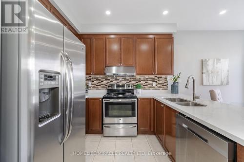 12 Robert Parkinson Drive, Brampton, ON - Indoor Photo Showing Kitchen With Stainless Steel Kitchen With Double Sink With Upgraded Kitchen