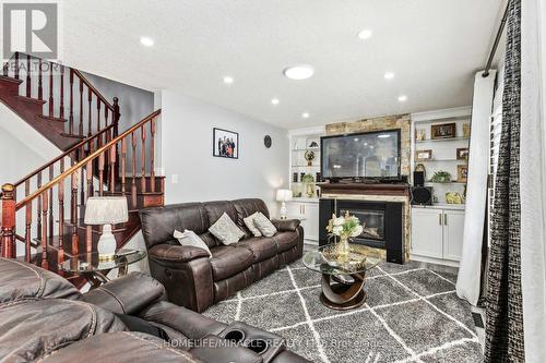 170 Southbrook Drive W, Hamilton, ON - Indoor Photo Showing Living Room With Fireplace