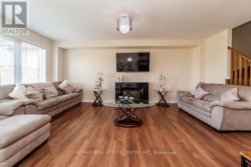 79 Sherway Street, Hamilton, ON - Indoor Photo Showing Living Room With Fireplace