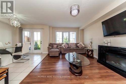 79 Sherway Street, Hamilton, ON - Indoor Photo Showing Living Room With Fireplace
