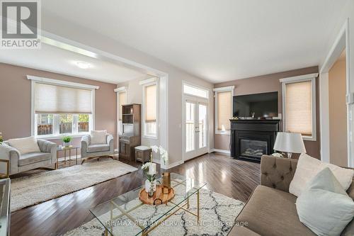 28 Benadir Avenue, Caledon, ON - Indoor Photo Showing Living Room With Fireplace