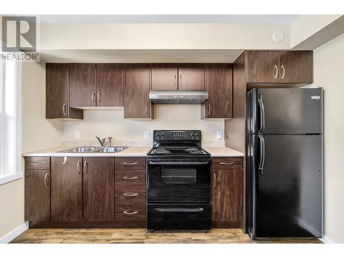 1477 Glenmore Road N Unit# 201B, Kelowna, BC - Indoor Photo Showing Kitchen With Double Sink