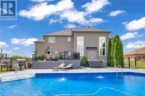6060 Catherine Duransky Drive, Essex, ON - Outdoor With In Ground Pool With Backyard