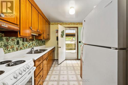 8987 Glendale Drive, Hamilton Township, ON - Indoor Photo Showing Kitchen With Double Sink