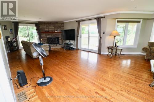 207 Slanted Road, Kawartha Lakes, ON - Indoor Photo Showing Living Room With Fireplace