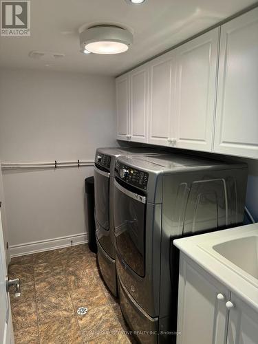 14 - 11 Vista Gardens, New Tecumseth, ON - Indoor Photo Showing Laundry Room