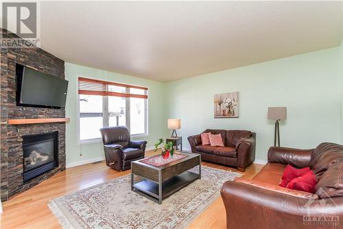 46 Whernside Terrace, Ottawa, ON - Indoor Photo Showing Living Room With Fireplace