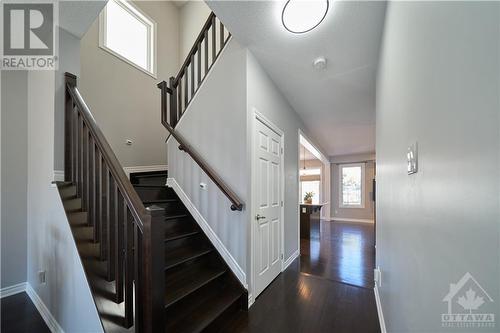 The elegant hardwood staircase leads to the 2nd level. - 540 Dundonald Drive, Ottawa, ON - Indoor Photo Showing Other Room
