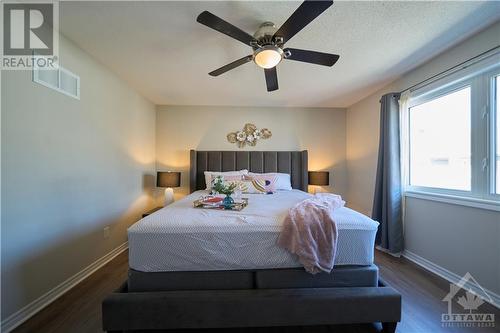 Spacious master suite which has a spa-inspired ensuite with a glass walk-in shower, and double sinks. - 540 Dundonald Drive, Ottawa, ON - Indoor Photo Showing Bedroom