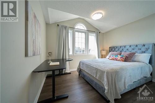 The 2nd bedroom features a charming vaulted ceiling. - 540 Dundonald Drive, Ottawa, ON - Indoor Photo Showing Bedroom