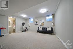 The partially finished basement provides a versatile space with an ensuite/ full bath. - 