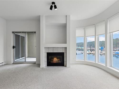 403-566 Stewart Ave, Nanaimo, BC - Indoor Photo Showing Living Room With Fireplace