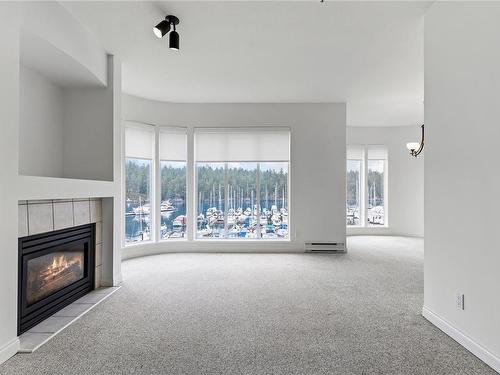 403-566 Stewart Ave, Nanaimo, BC - Indoor Photo Showing Living Room With Fireplace