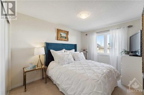 Spacious secondary bedroom - 224 Macoun Circle, Ottawa, ON - Indoor Photo Showing Bedroom