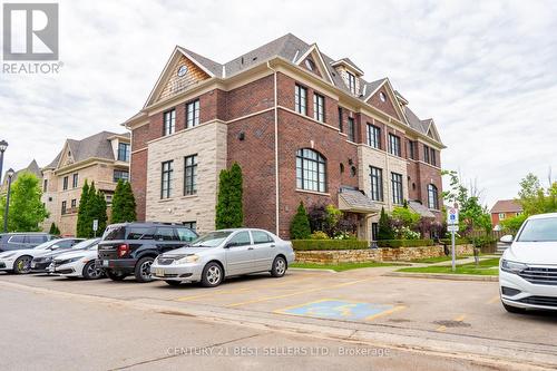 2027 Queensborough Gate, Mississauga, ON - Outdoor With Facade