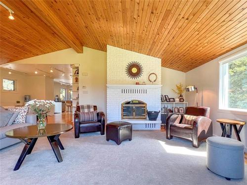 73 Jerome Drive, Brandon, MB - Indoor Photo Showing Living Room With Fireplace