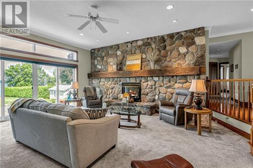 15947 Sunset Drive, Long Sault, ON - Indoor Photo Showing Living Room With Fireplace