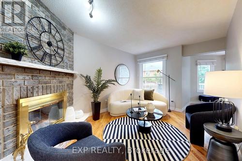 113 Large Crescent, Ajax, ON - Indoor Photo Showing Living Room With Fireplace