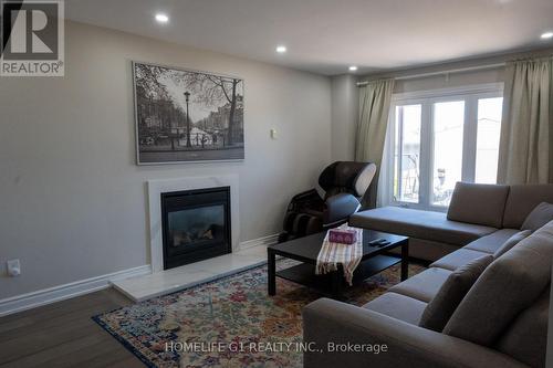 47 Zinnia Place, Vaughan, ON - Indoor Photo Showing Living Room With Fireplace
