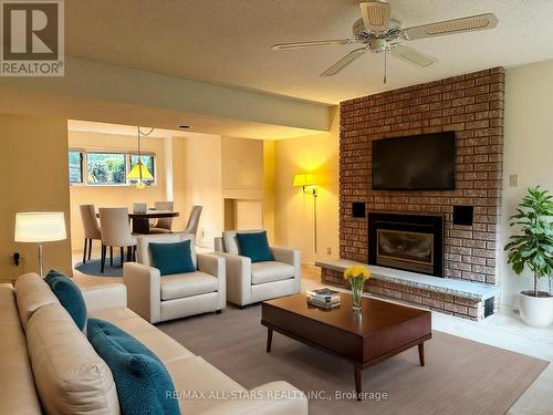 7 Patricia Place, Kawartha Lakes, ON - Indoor Photo Showing Living Room With Fireplace