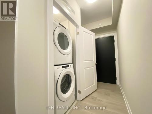 1308 - 3220 William Coltson Avenue, Oakville, ON - Indoor Photo Showing Laundry Room