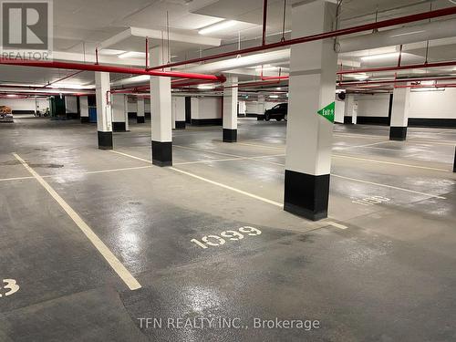 1308 - 3220 William Coltson Avenue, Oakville, ON - Indoor Photo Showing Garage